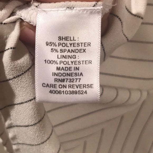 ELLE Asymmetrical Striped Sleeveless Peplum Top - Picture 9 of 10